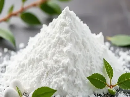 A mound of white calcium BHB powder with green leaves