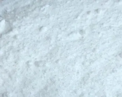 Close view of fine white sodium BHB powder